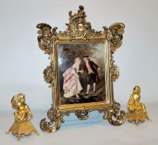 Pair of golden bronze putti & reverse glass print of a rococo couple around 1900