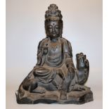 Bodhisattva Avalokiteshvara on a lion, large Chinese cast iron sculpture in the Ming style, probabl