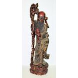 Large wooden sculpture of the Daoist immortal Shoulao, China, c. 1900