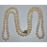 Long pearl necklace with gold