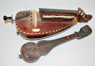 An antique hurdy-gurdy by Pajot Jeune in Jenzat, France around 1880/90 and a 19th century Nepalese 