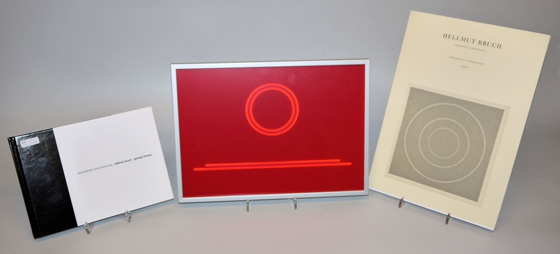 Hellmut Bruch, "Kreisumfang aufgerollt II", fluorescent red acrylic glass multiple, framed, with 2 