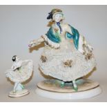 Porcelain sculpture of a lady in crinoline & and a small dancer, Ens, Volkstedt, early 20th century