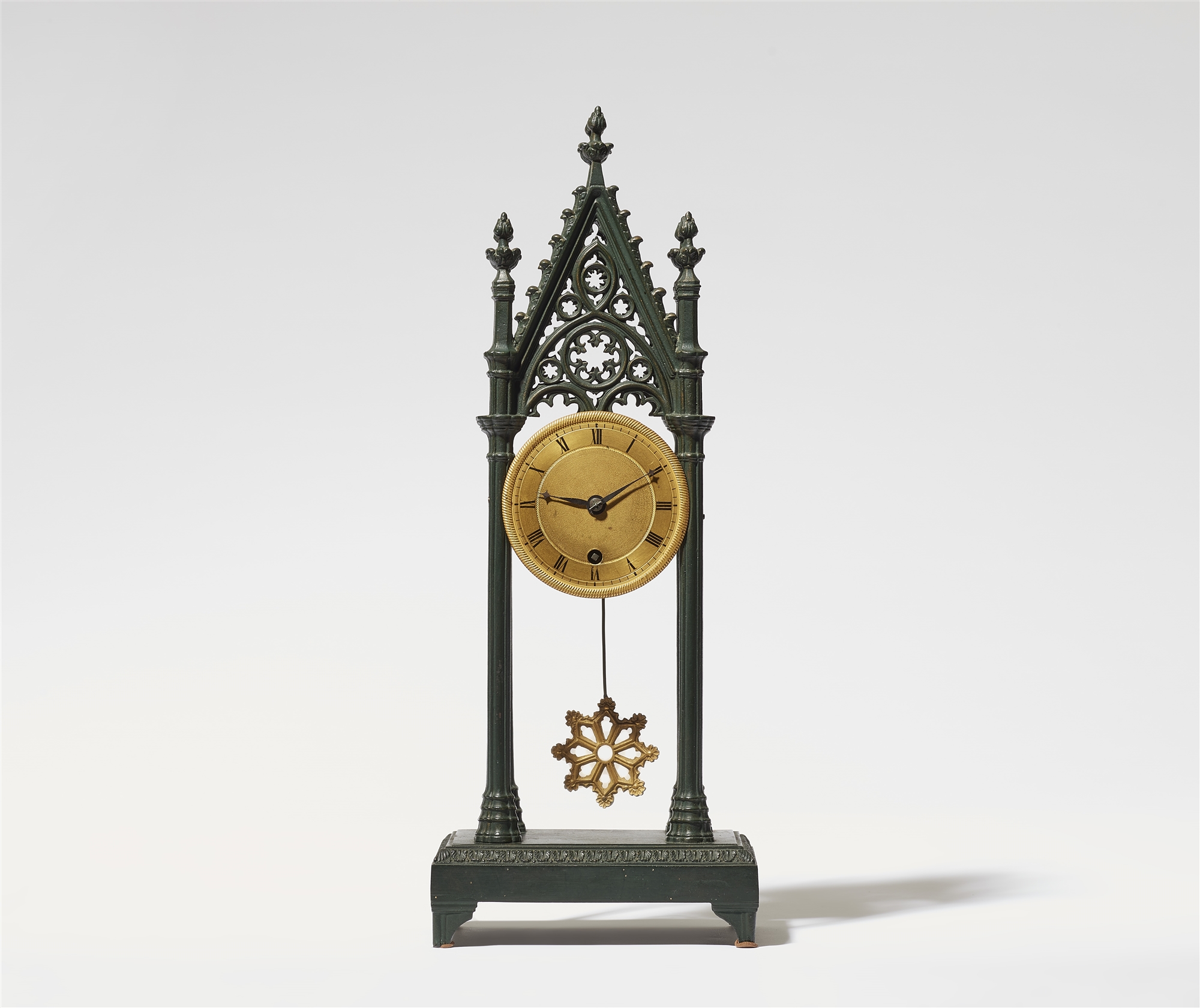 A Neogothic cast iron table clock