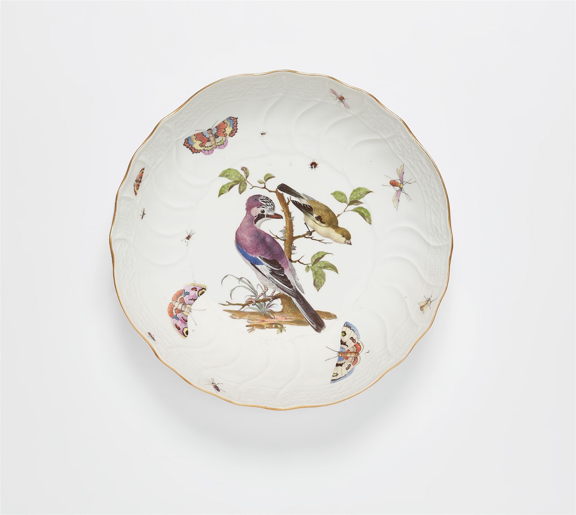 A Meissen porcelain bowl from a dinner service with Continental birds and wildflowers made for King