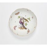 A Meissen porcelain bowl from a dinner service with Continental birds and wildflowers made for King