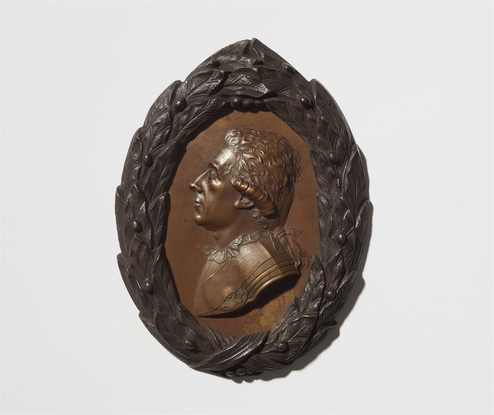A bronze plaque with a portrait of Prince Heinrich