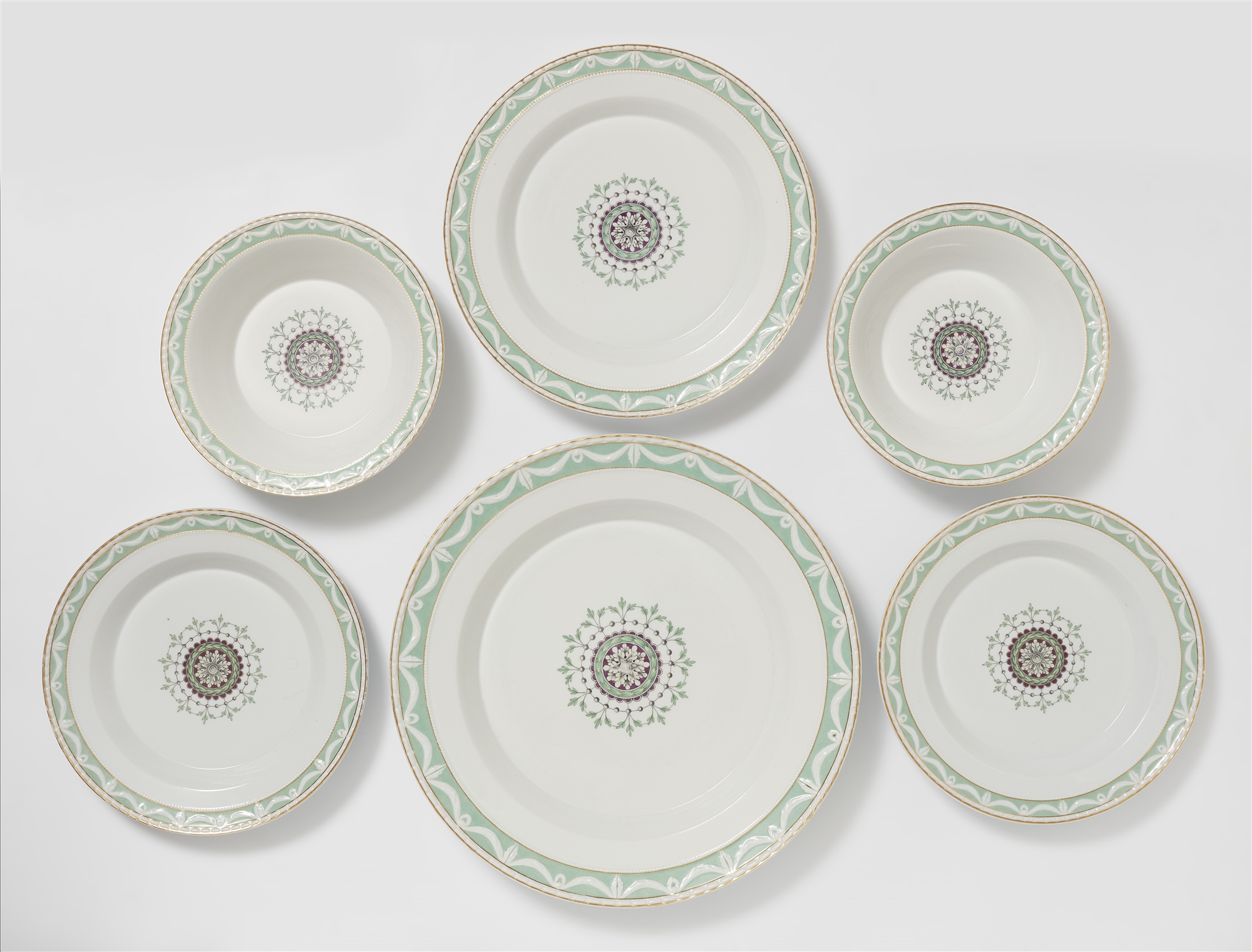 Six Berlin KPM porcelain dishes from a dinner service with a Neoclassical medallion