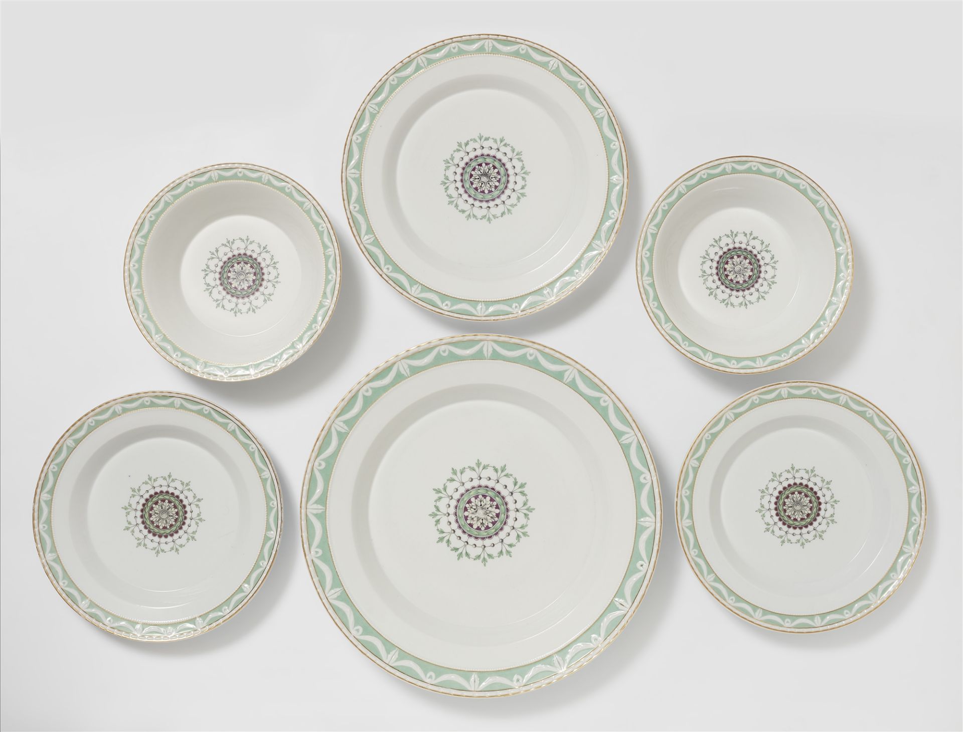 Six Berlin KPM porcelain dishes from a dinner service with a Neoclassical medallion