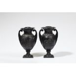 A pair of rare cast iron potpourri vases