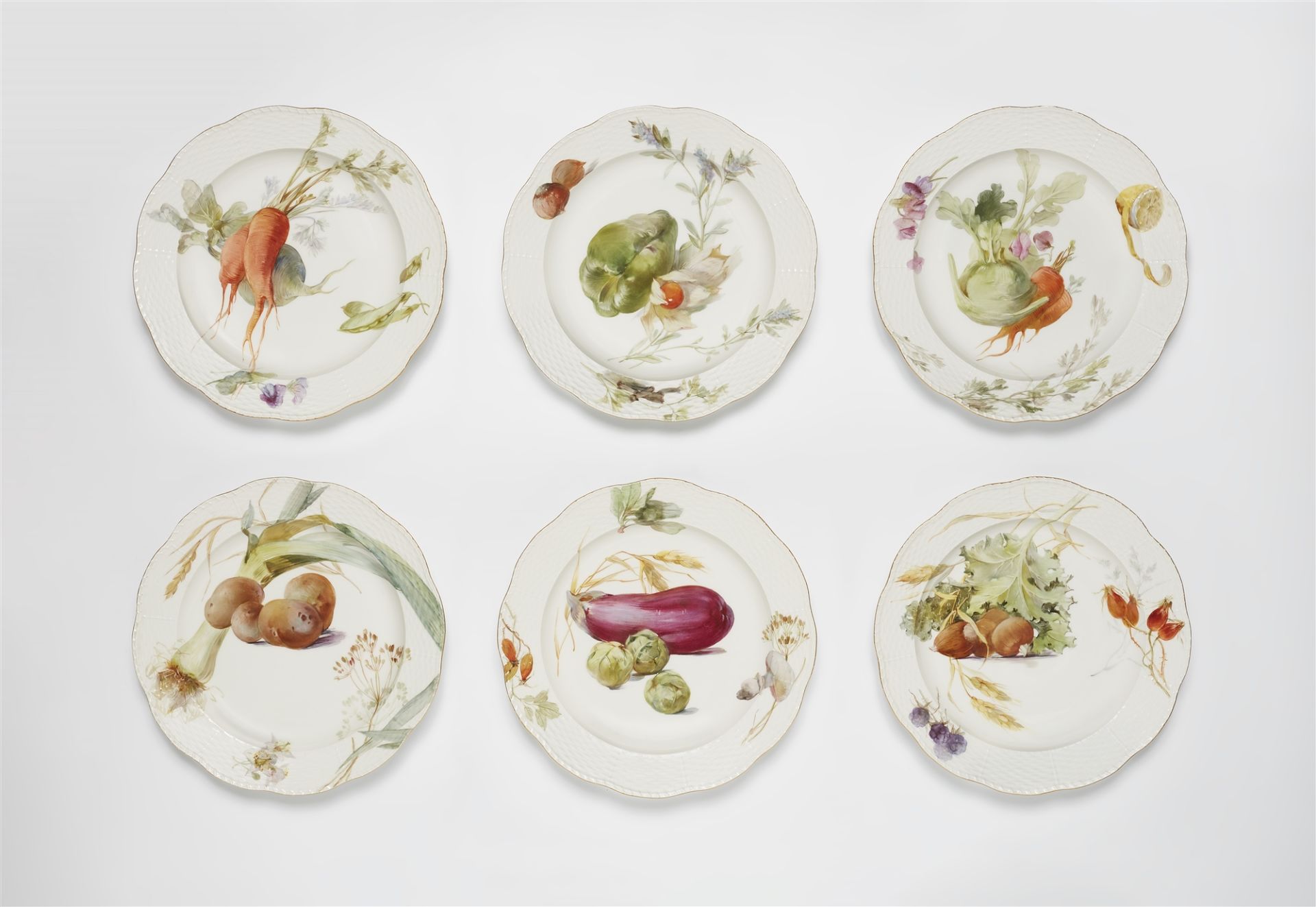 Six Berlin KPM porcelain plates from a dinner service with vegetable motifs in "weichmalerei"