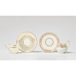 Two Neoclassical Berlin KPM porcelain teacups and saucers