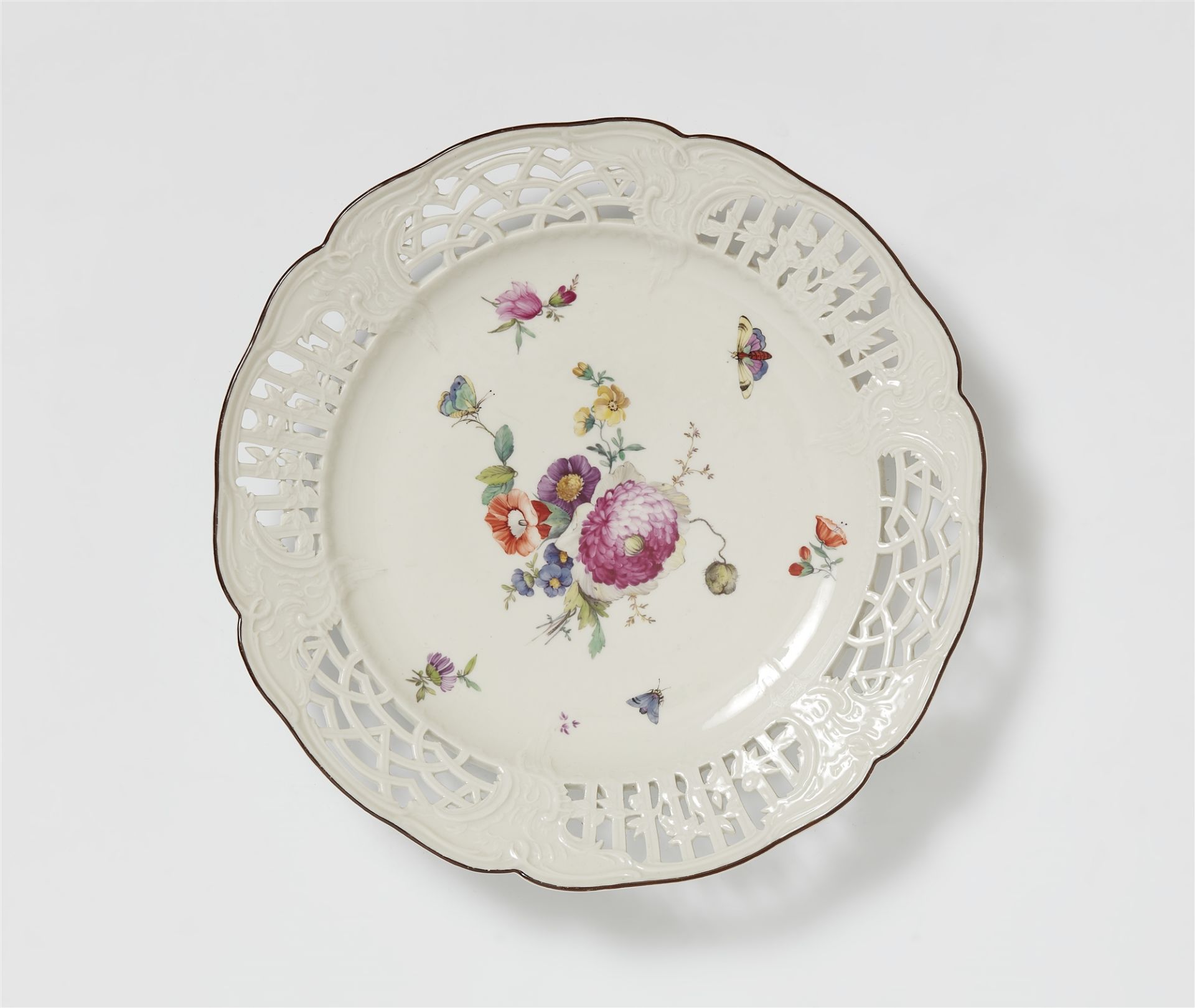 A Berlin KPM porcelain dessert plate from a dinner service for Prince Heinrich