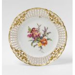 A Berlin KPM porcelain dessert plate from a royal dinner service