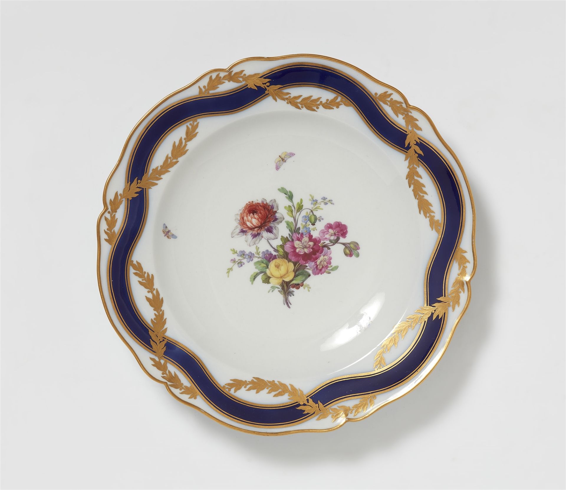 A Berlin KPM porcelain dinner plate from the last dinner service for King Friedrich II