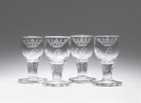 Four cut glass goblets with crowned L monograms