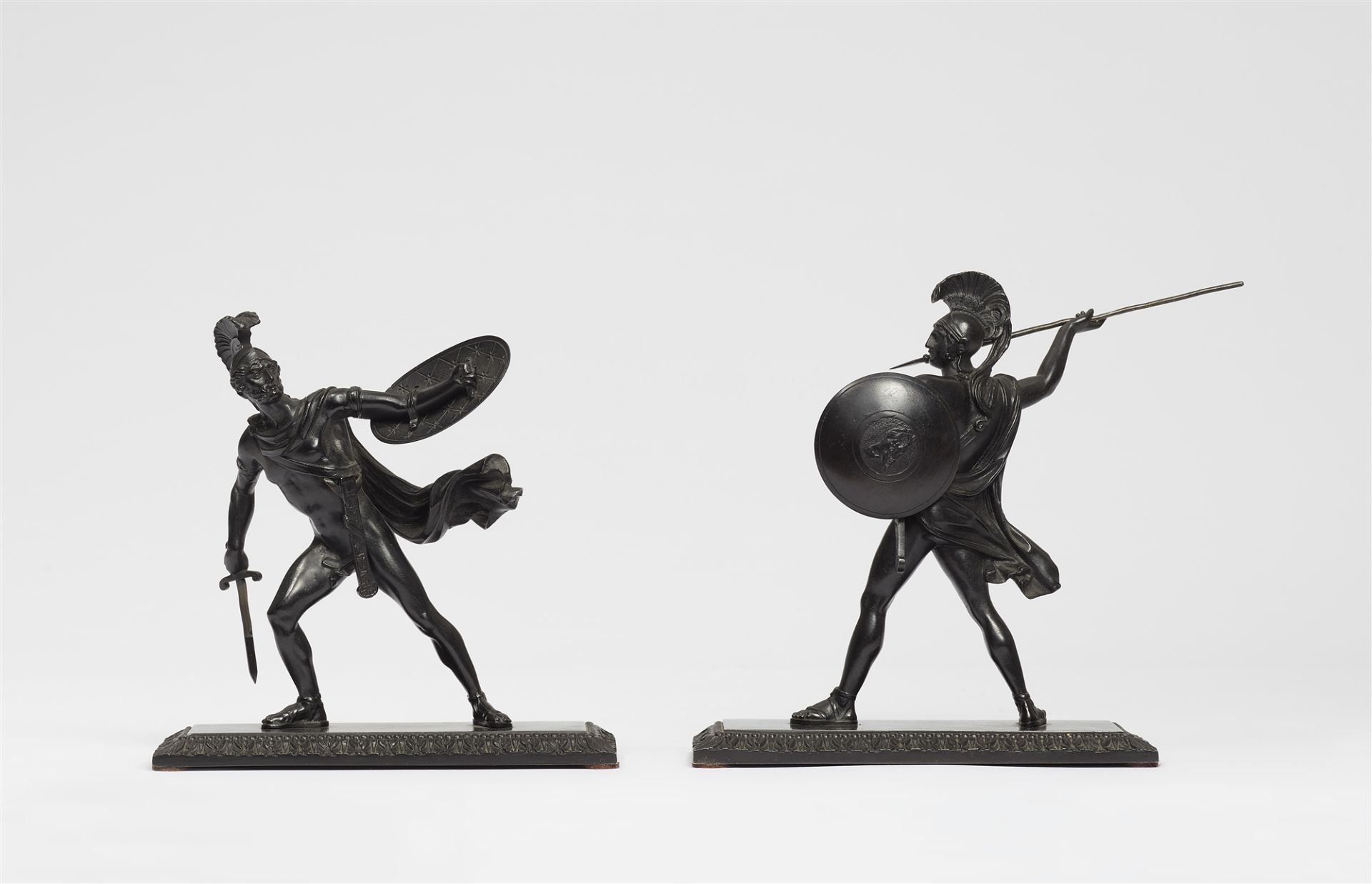 Cast iron statuettes of Romulus and Titus Tatius