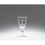 A cut glass goblet inscribed "Un seul me suffit"