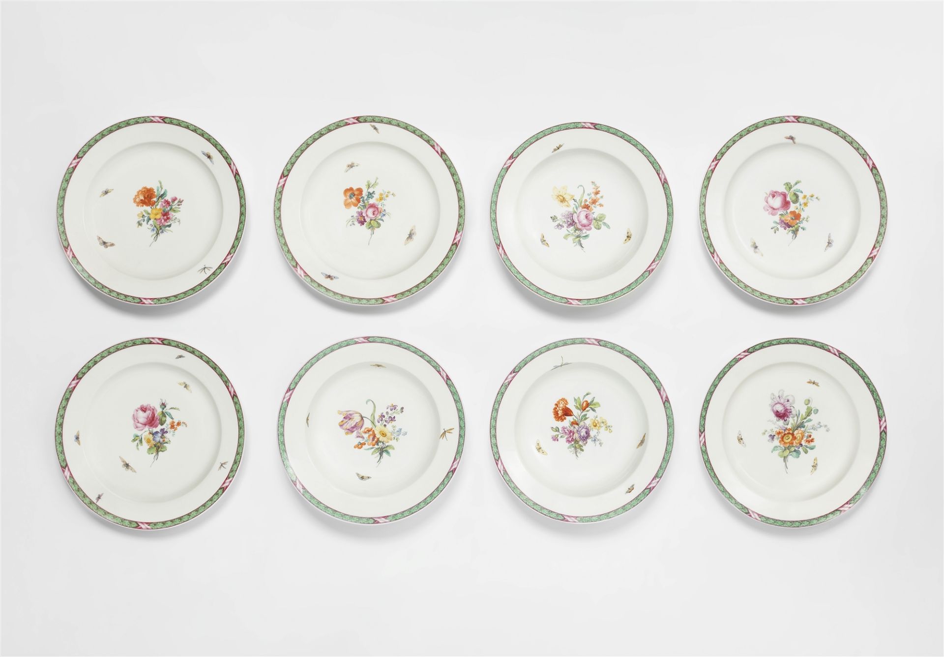 Five Berlin KPM porcelain dinner plates and three soup bowls from a service with oak leaf borders