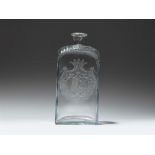 A Bohemian cut and wheel engraved glass carafe with an arms of alliance