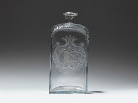 A Bohemian cut and wheel engraved glass carafe with an arms of alliance