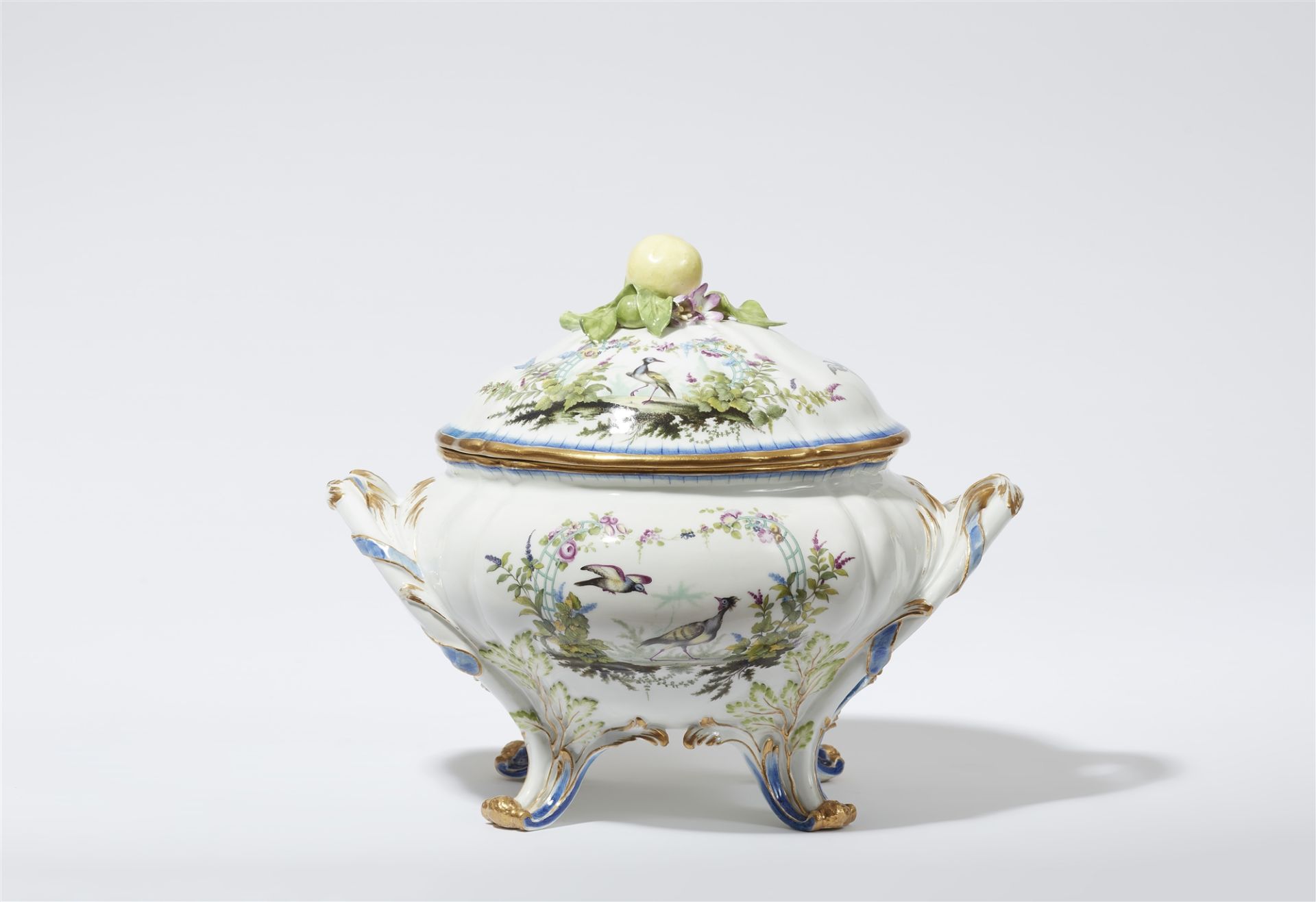 A round Meissen porcelain tureen with birds beneath arbours