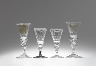 Four Saxon glass goblets with monograms