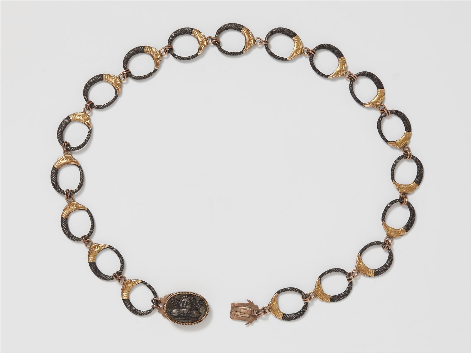 A gold and iron necklace
