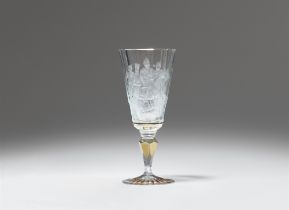 A cut and gilt glass goblet with the "Three Emperors"