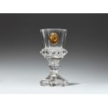 A Bohemian cut glass goblet with a glass paste portrait