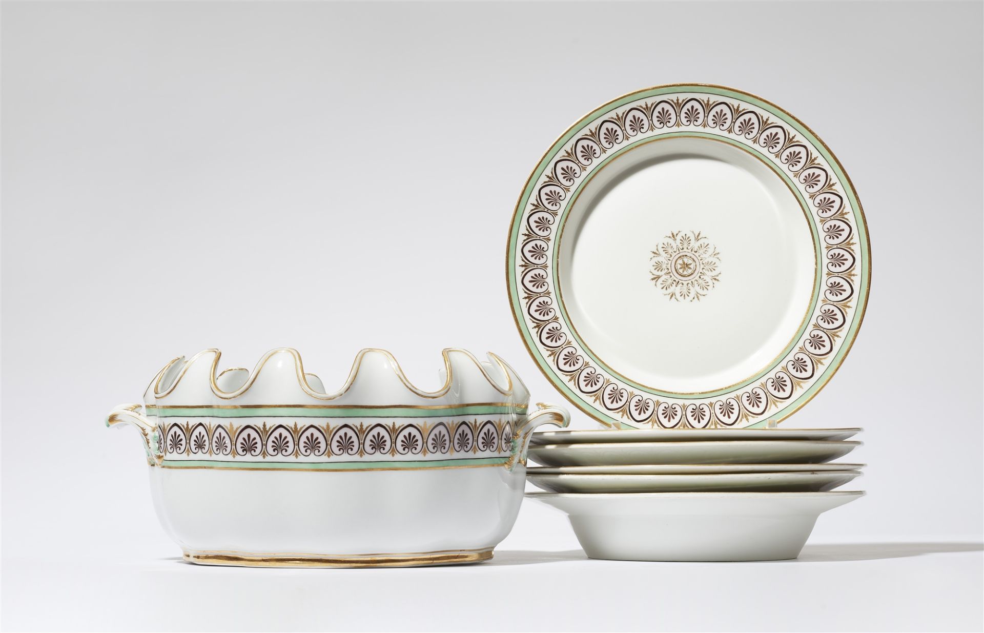 Seven Berlin KPM porcelain items from a Neoclassical service