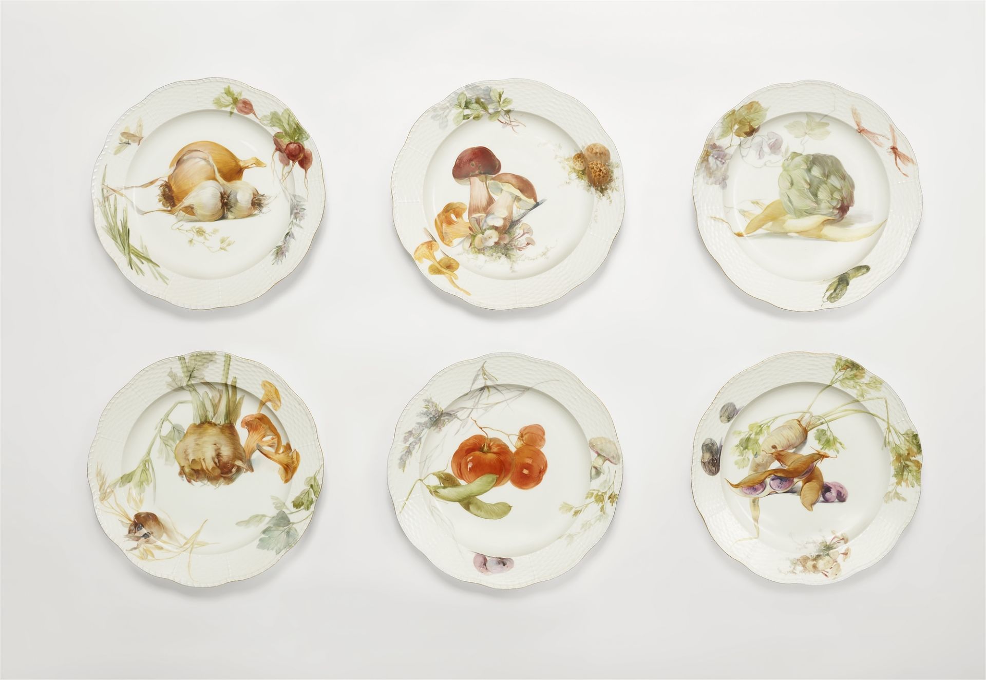 Six Berlin KPM porcelain plates from a dinner service with vegetable motifs in "weichmalerei"