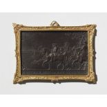 A burnished bronze plaque with Friedrich II parading the troops