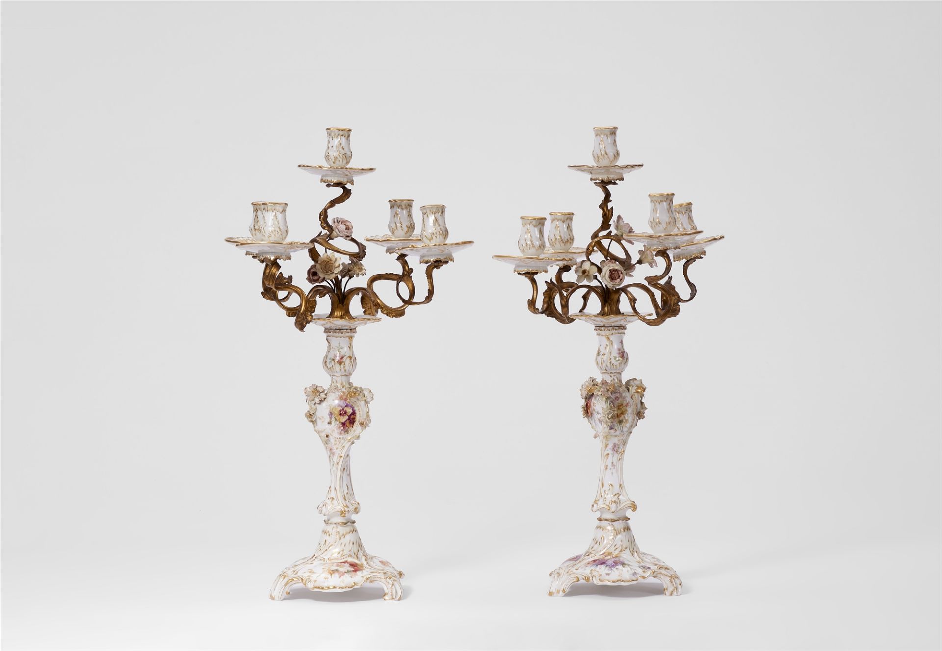 A pair of Berlin KPM bronze-mounted porcelain candelabra