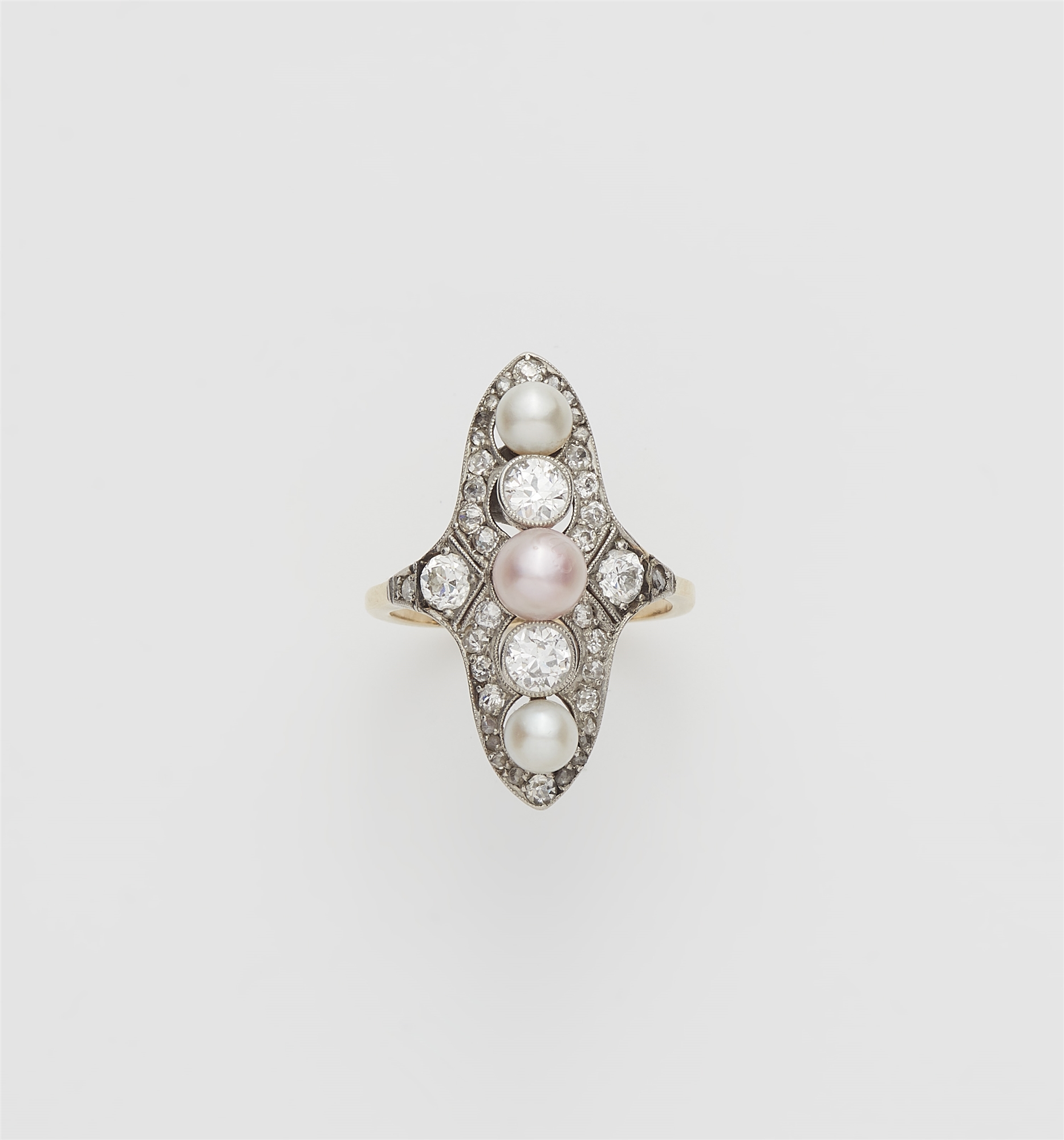 An Art Déco 14k gold platinum diamond and pearl Marquise ring.