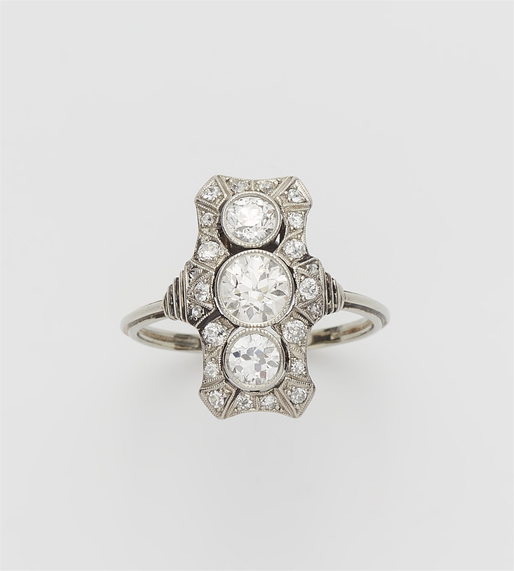 An Art Déco platinum 14k white gold and diamond ring.