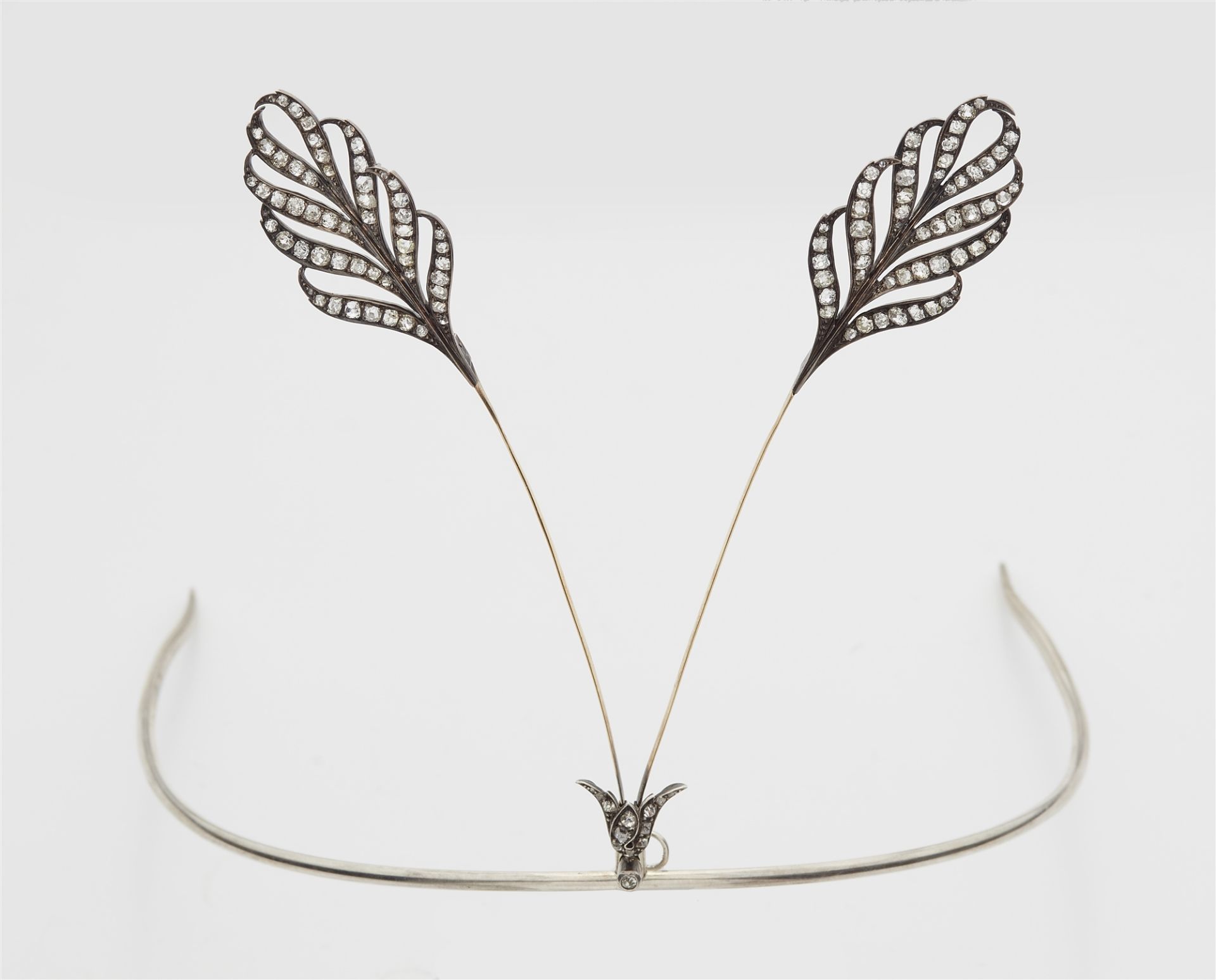 A silver 14k gold and diamond tremblant feather aigrette headdress.