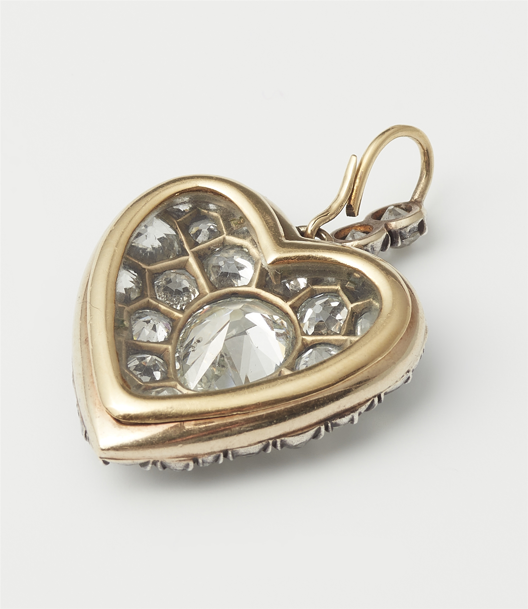 A Victorian silver 18k gold and diamond heart locket. - Image 2 of 2