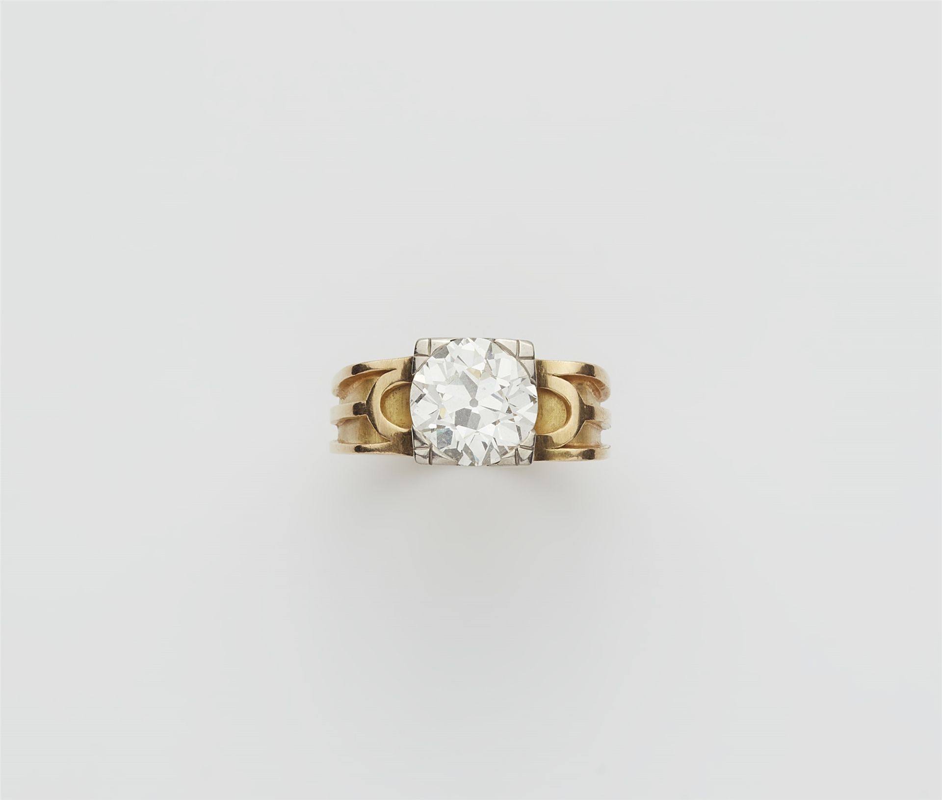 An 18k yellow gold and European old-cut diamond solitaire ring.