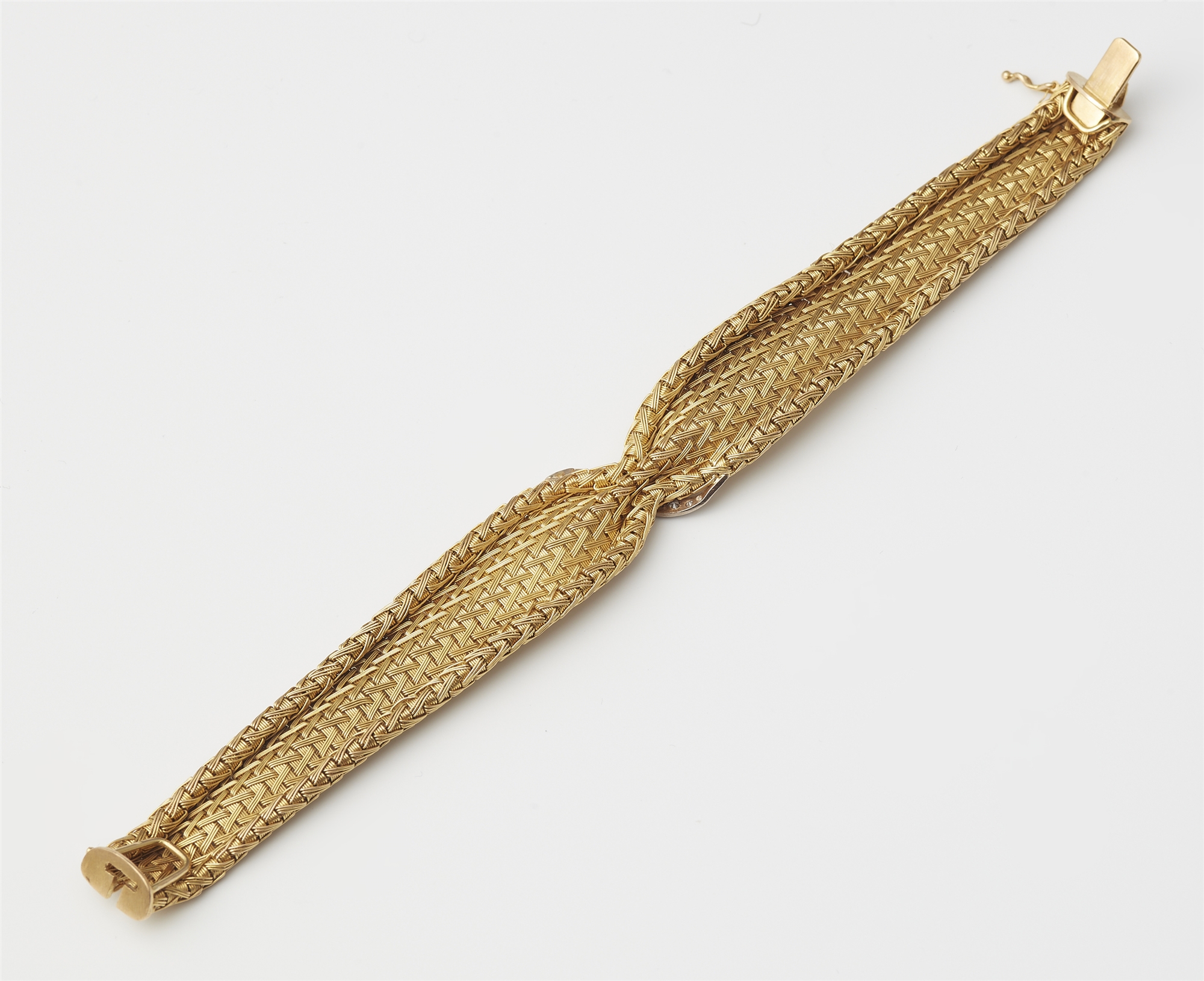 A flexible 18k gold meshwork bracelet with diamond strip. - Image 2 of 2