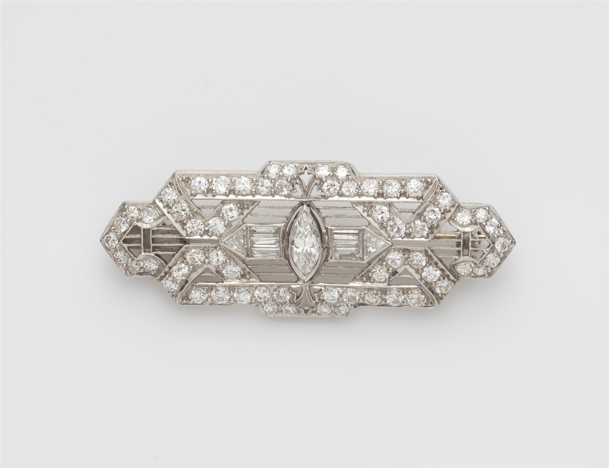 A platinum and diamond Art Déco brooch.