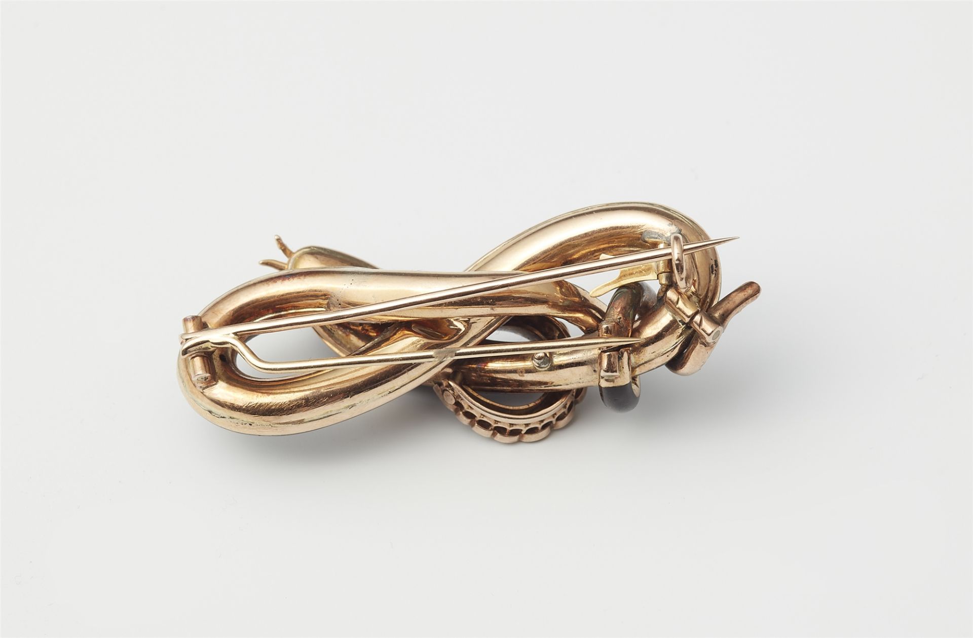 A late 19th century 14k gold black enamel and diamond snake brooch. - Image 2 of 2