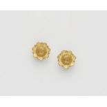 A pair of German 14k gold granulation screw earrings.