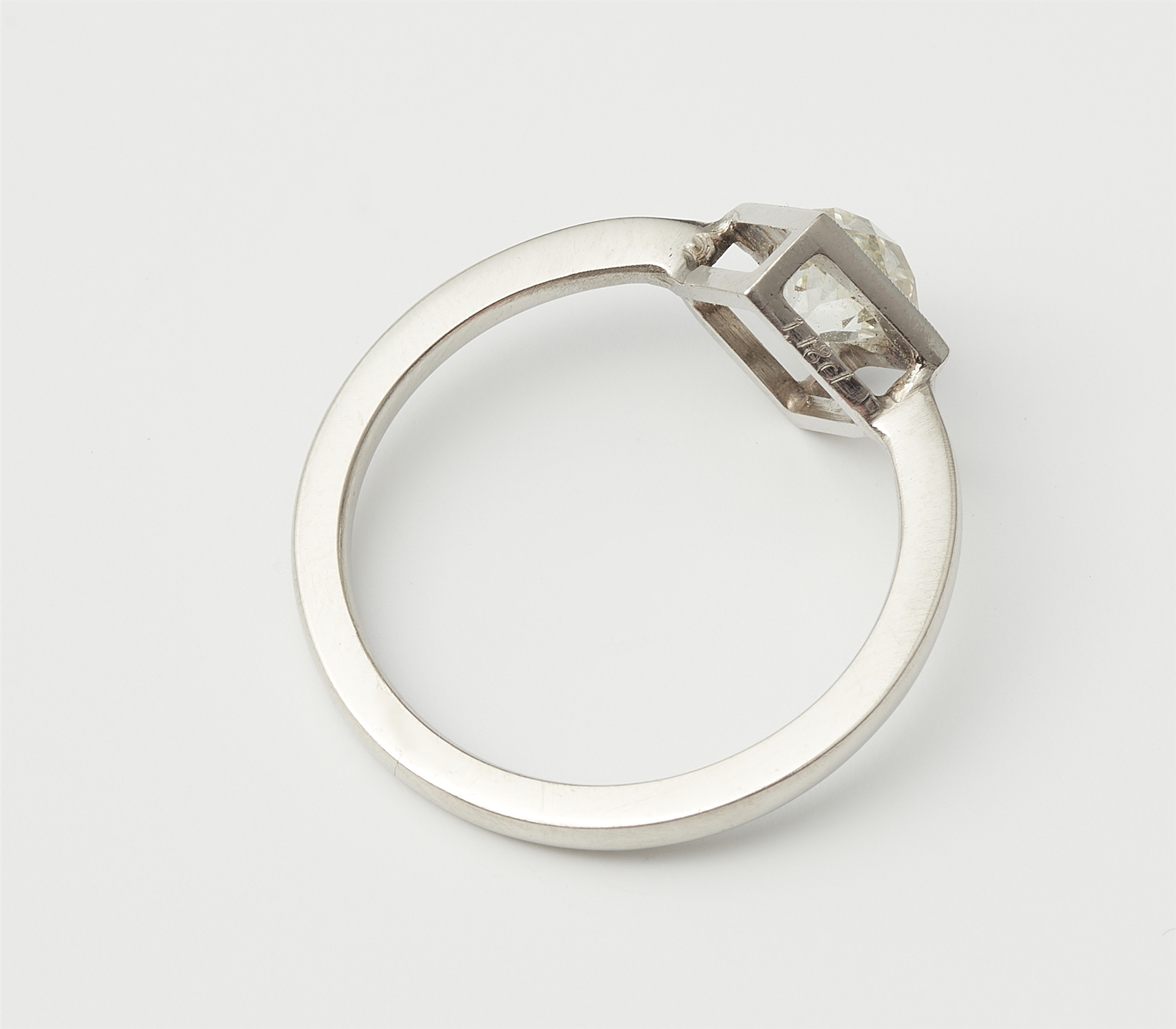 A platinum and European old-cut diamond solitaire ring. - Image 2 of 2