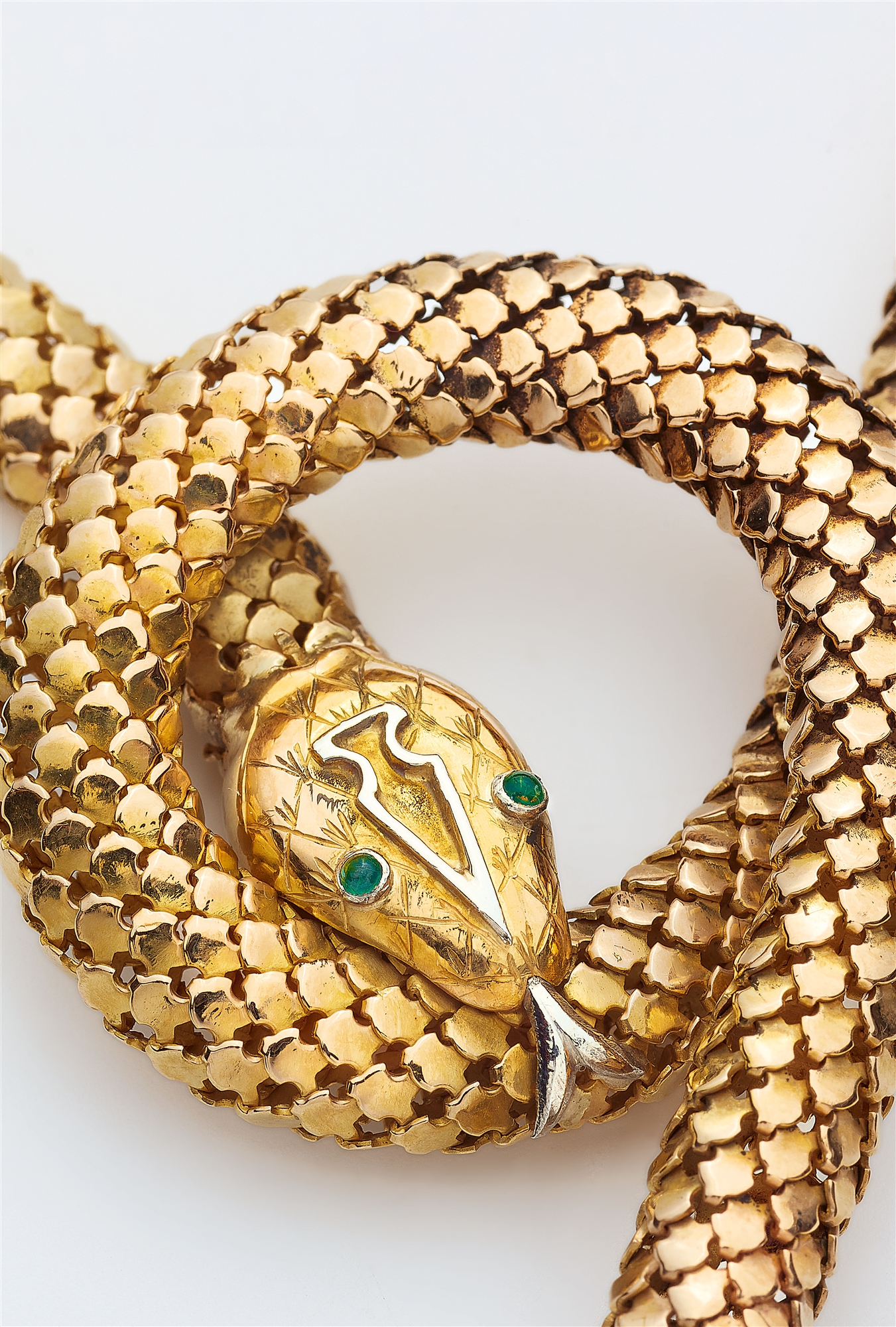 A flexible 18k red gold tubogaz snake necklace with emerald eyes. - Image 2 of 3