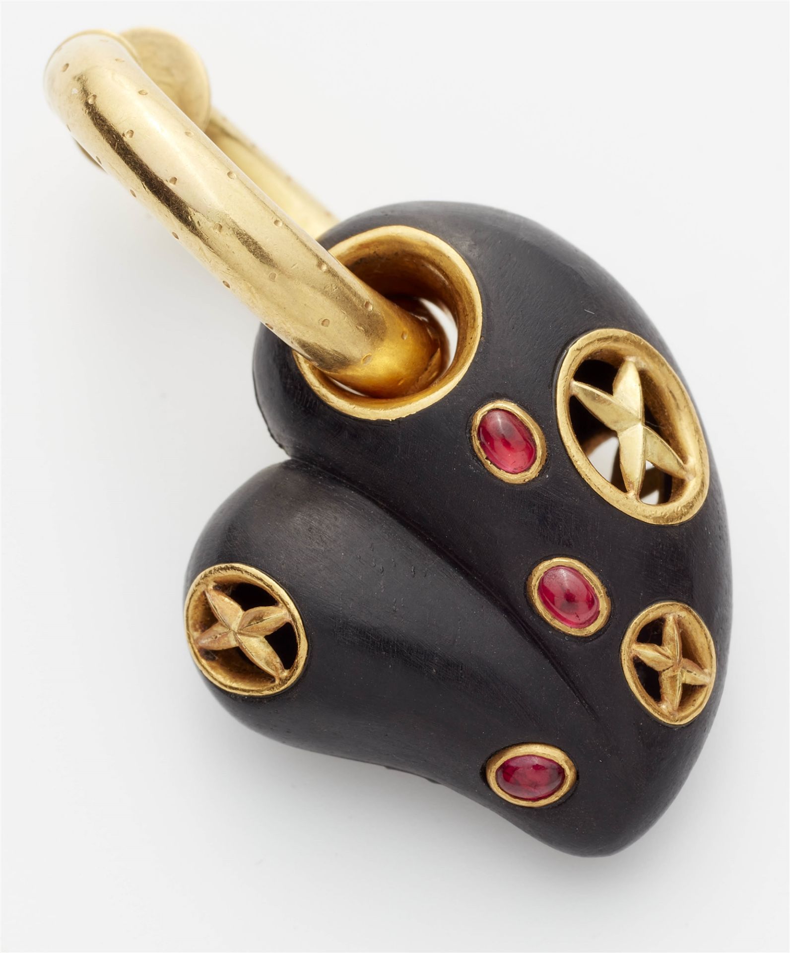 A pair of 18kt gold hoop earrings with ruby set carved ebony heart pendants. - Image 3 of 3