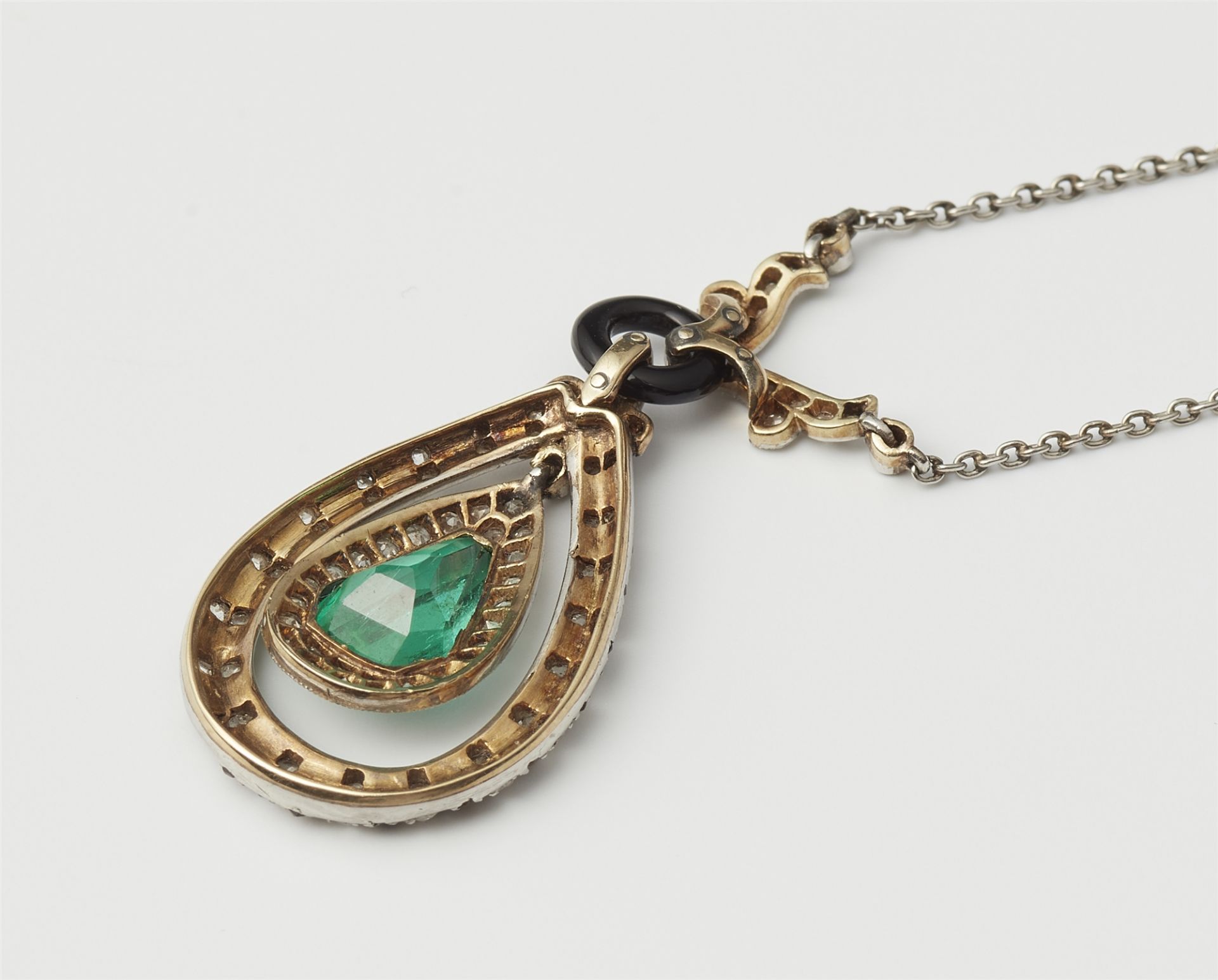 A platinum and 14k gold black enamel diamond onyx and emerald Art Déco pendant necklace. - Image 3 of 3