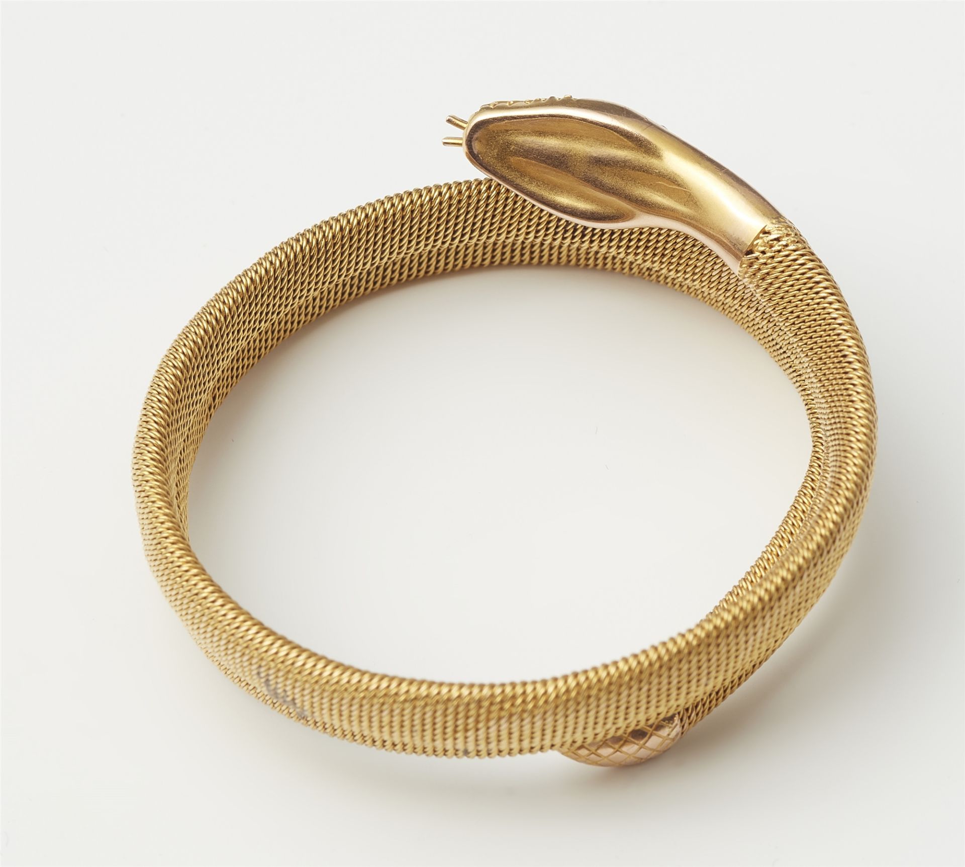 A Victorian 15k gold ruby and diamond flexible snake bangle. - Image 2 of 2