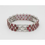 A magnificent platinum ruby and diamond Art Déco bracelet.