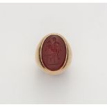 An 18k rose gold gentlemans' signet ring with a Neoclassical carnelian intaglio.